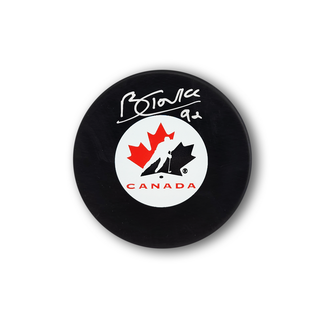 Brandt Clarke Autographed Team Canada Hockey Puck