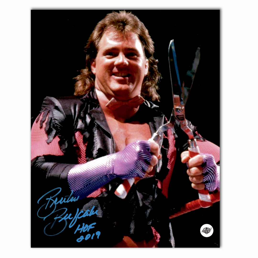 Brutus Beefcake Autographed WWE 8x10 Photo (Holding Sheers)