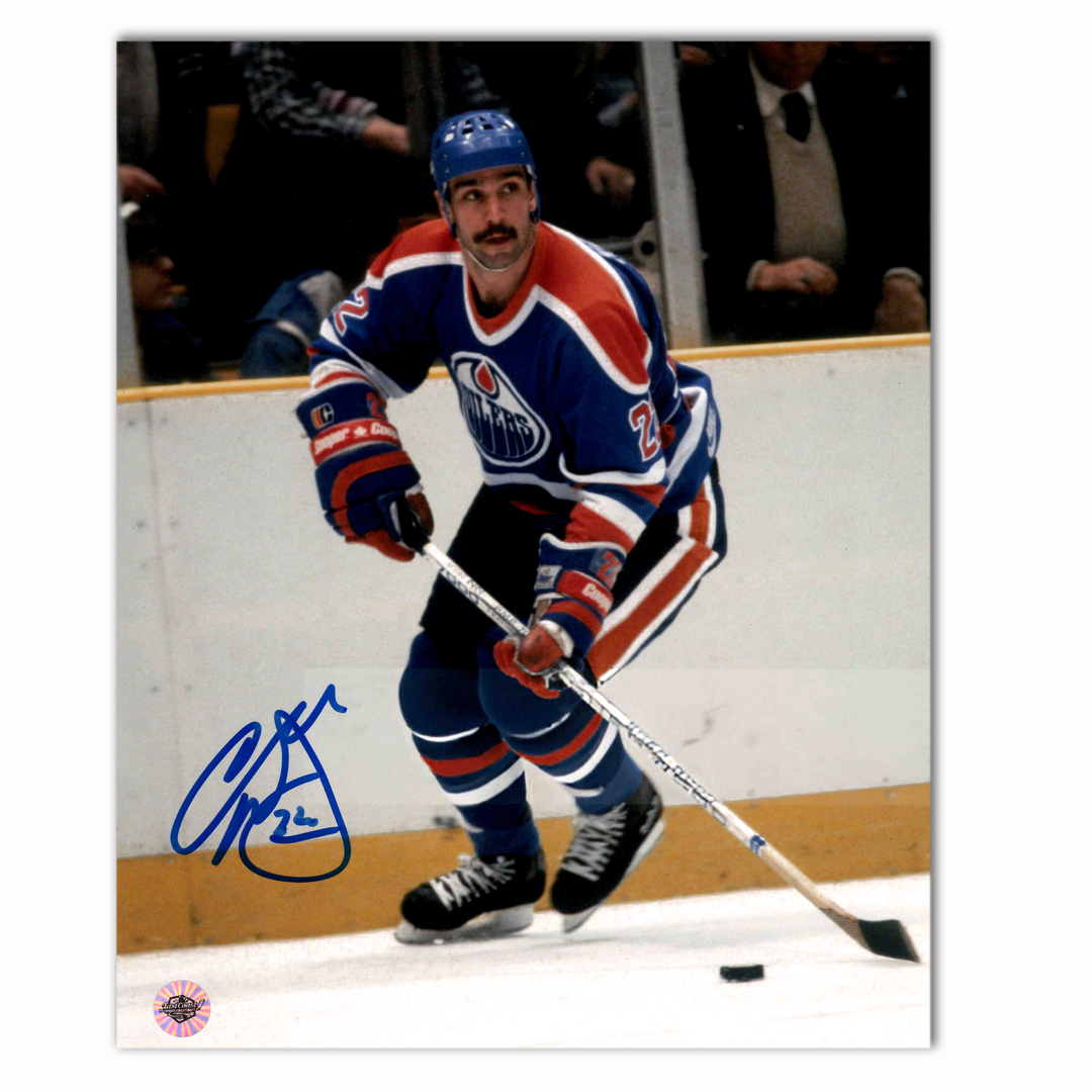 Charlie Huddy Autographed Edmonton Oilers Home 8x10 Photo (With Puck)