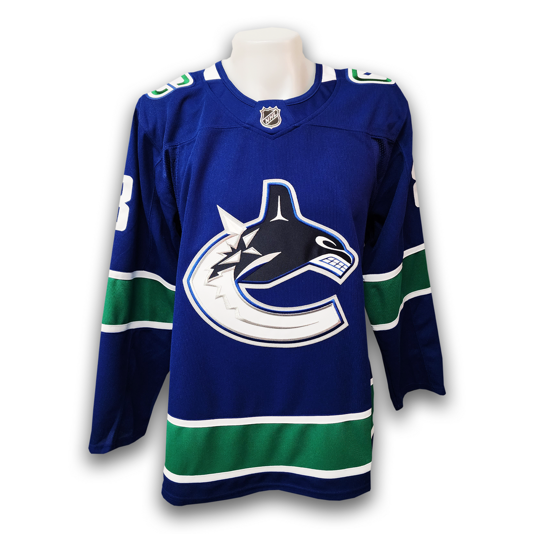 Conor Garland Autographed Vancouver Canucks Home Fanatics Premium Jersey