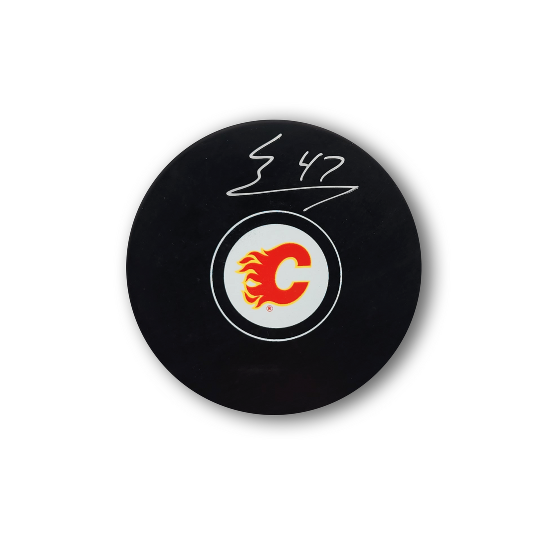 Connor Zary Autographed Calgary Flames Hockey Puck