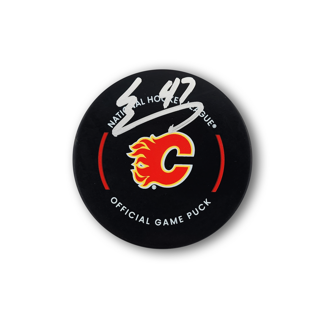 Connor Zary Autographed Calgary Flames Official Hockey Puck