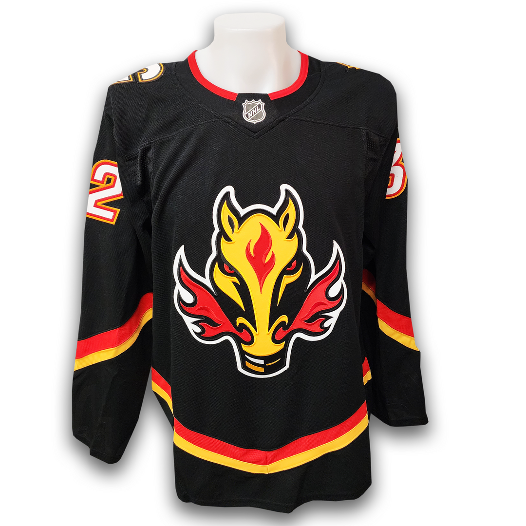 Dustin Wolf Autographed Calgary Flames Alternate Fanatics Premium Jersey