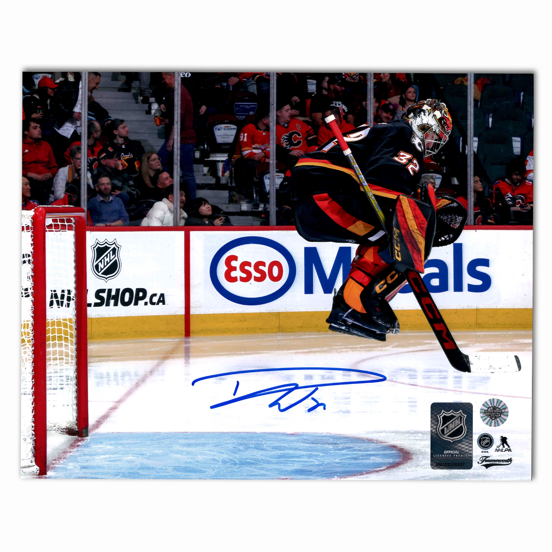 Dustin Wolf Autographed Calgary Flames Alternate Jumping Horizontal 8x10 Photo