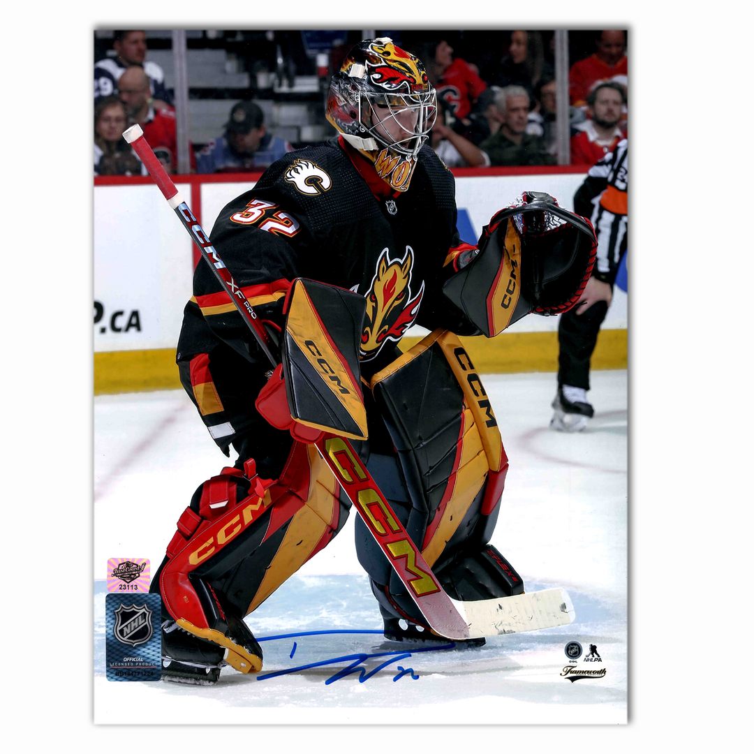Dustin Wolf Autographed Calgary Flames Alternate Photo 8x10