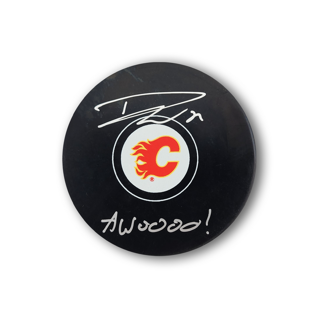 Dustin Wolf Autographed Calgary Flames Hockey Puck Inscribed Awooo!