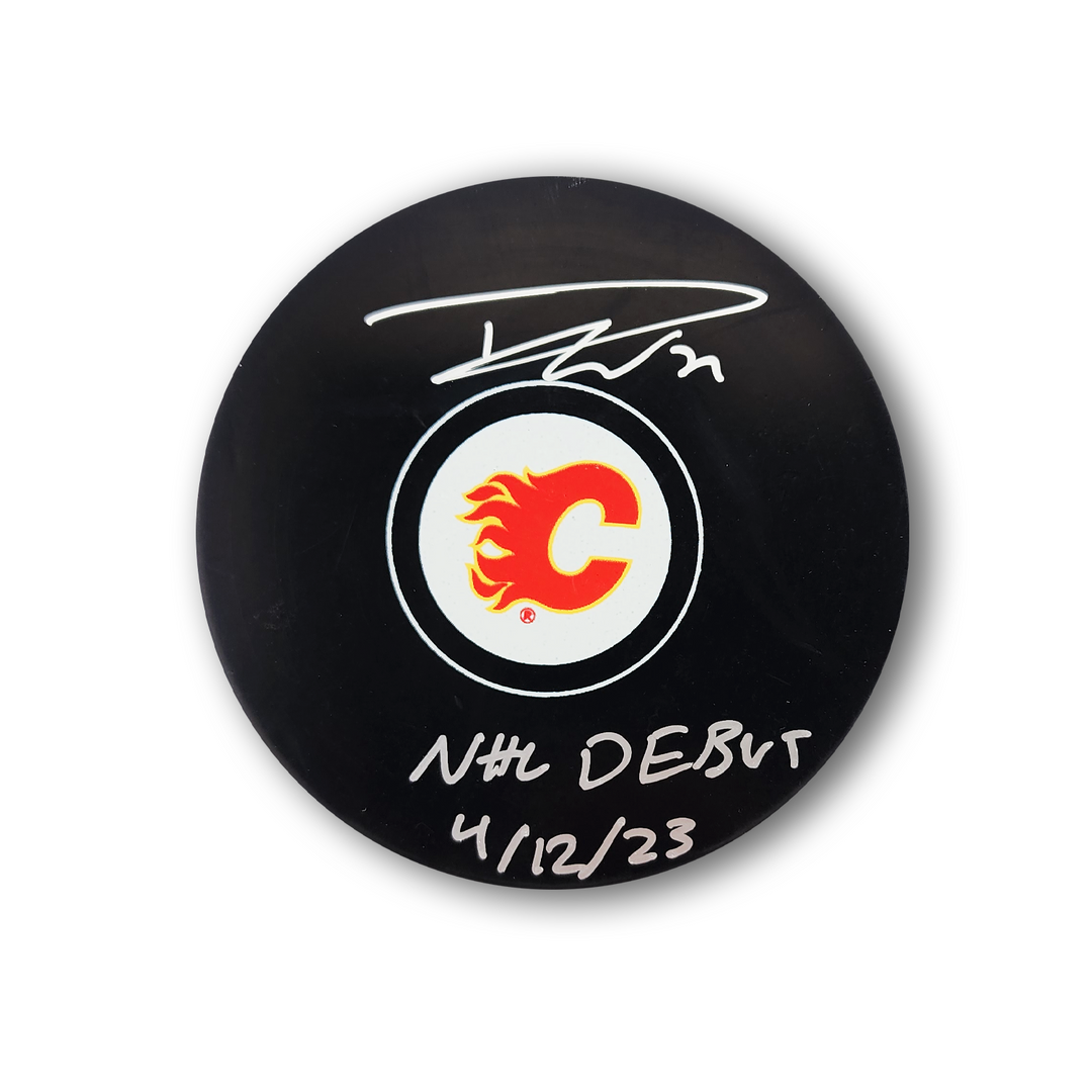 Dustin Wolf Autographed Calgary Flames Hockey Puck Inscribed NHL Debut