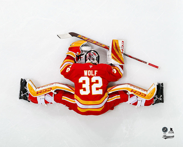 Pre-Order - Dustin Wolf Autographed Calgary Flames Home Stretching 8x10 Photo