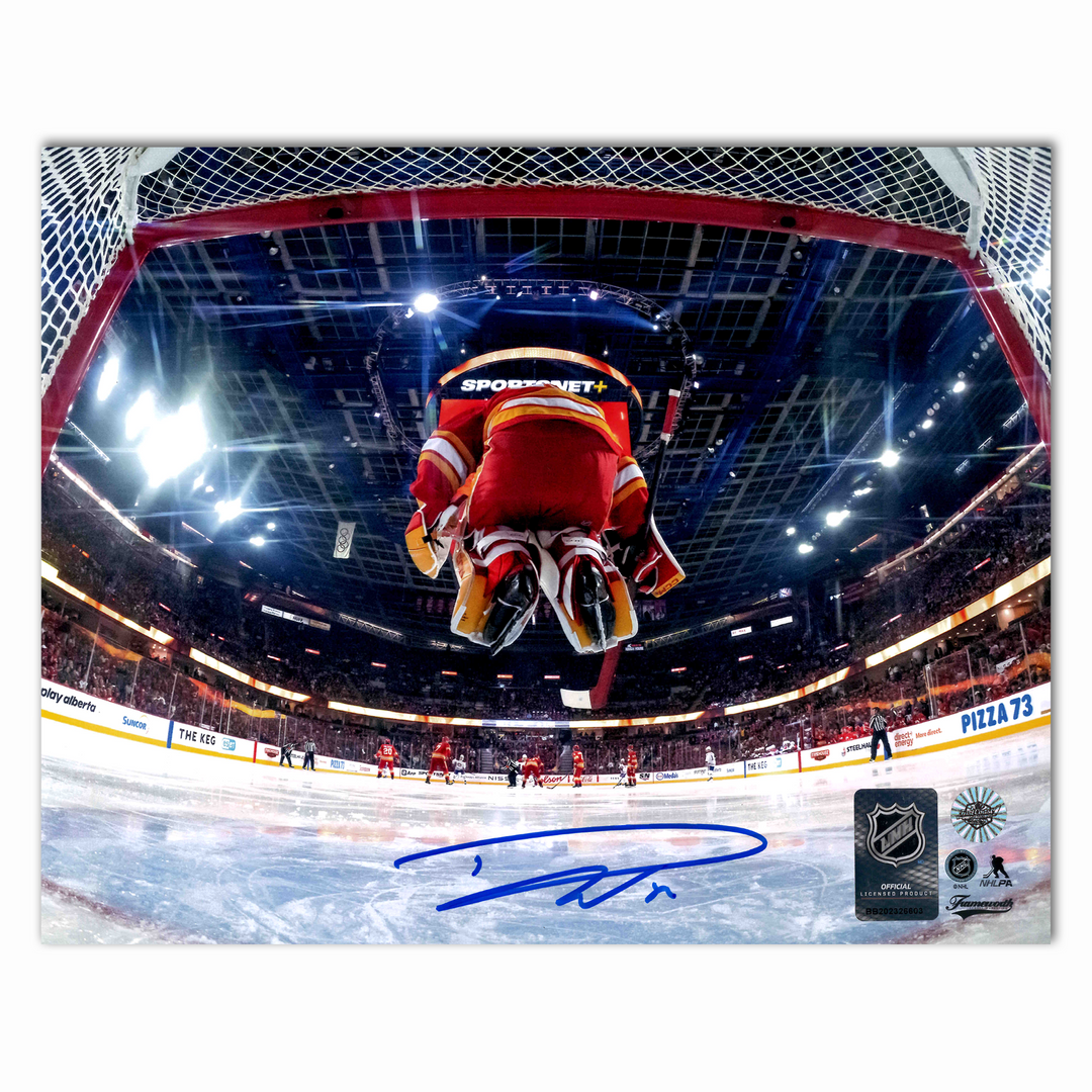 Dustin Wolf Autographed Calgary Flames Jumping In Net Home 8x10 Photo