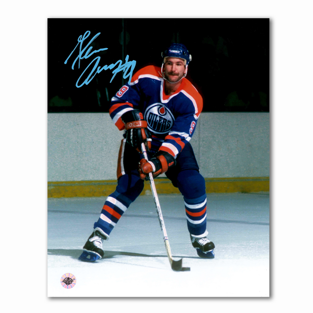 Glenn Anderson Autographed Edmonton Oilers Home 8x10 Photo (With Puck)