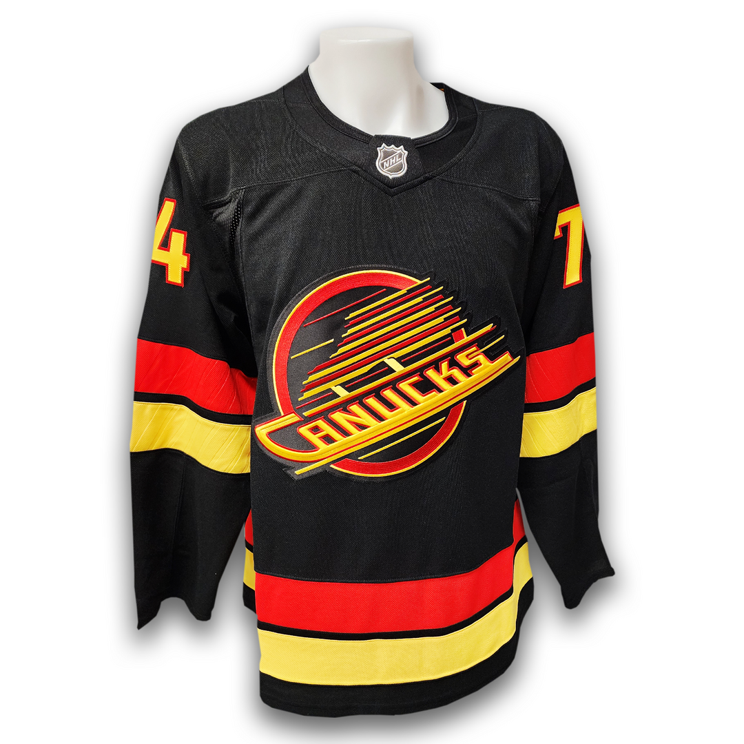 Jake Debrusk Autographed Vancouver Canucks Alternate Fanatics Premium Jersey