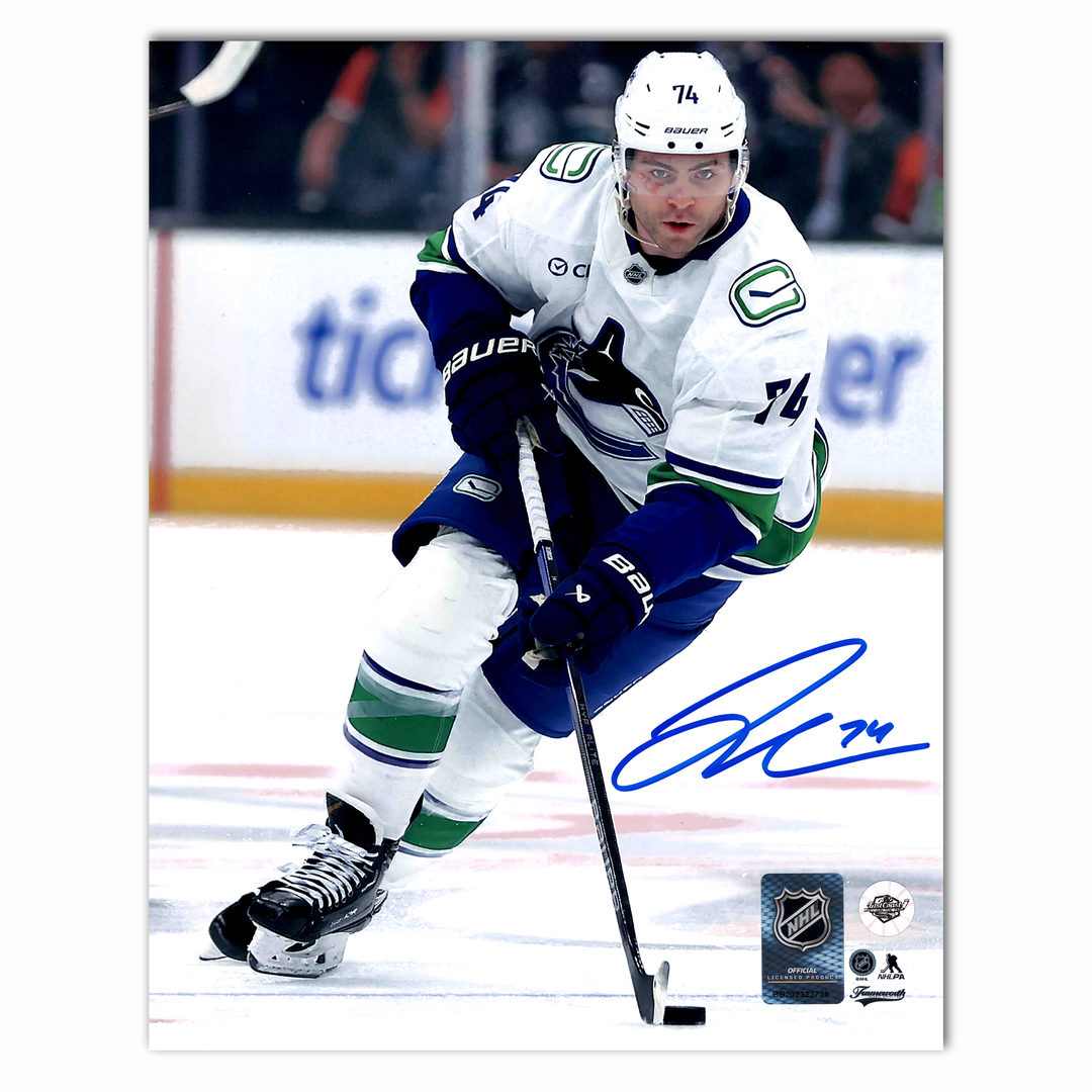 Jake Debrusk Autographed Vancouver Canucks Away 8x10 Photo