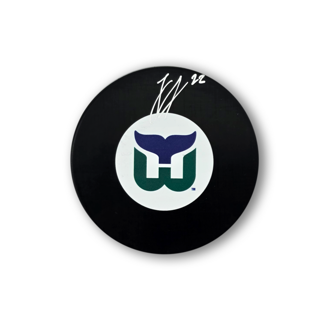 Logan Stankoven Autographed Carolina Hurricanes Hockey Puck (Hartford Whalers)
