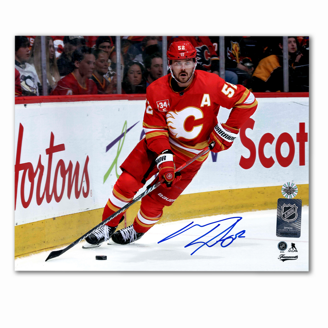 MacKenzie Weegar Autographed Calgary Flames Home Horizontal 8x10 Photo