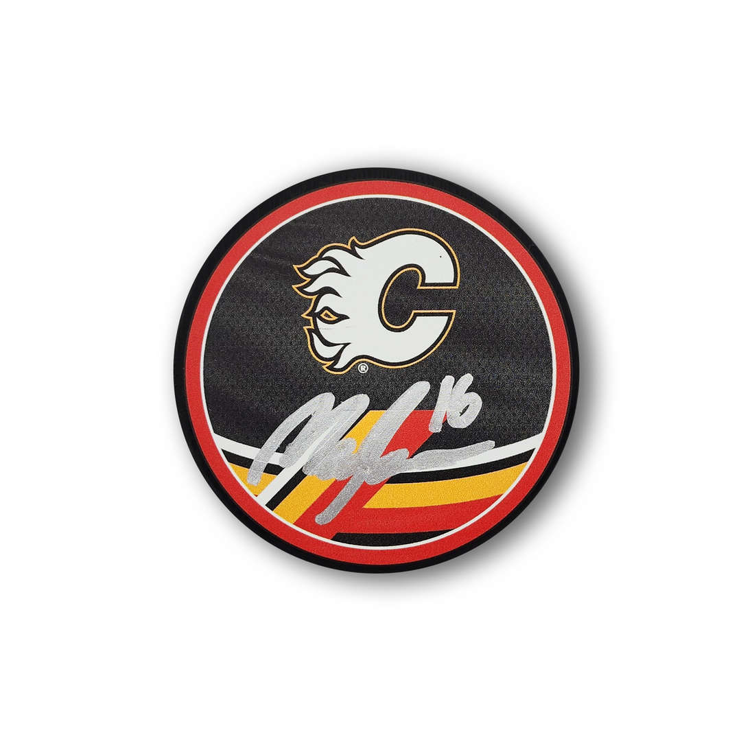 Morgan Frost Autographed Calgary Flames Reverse Retro Hockey Puck