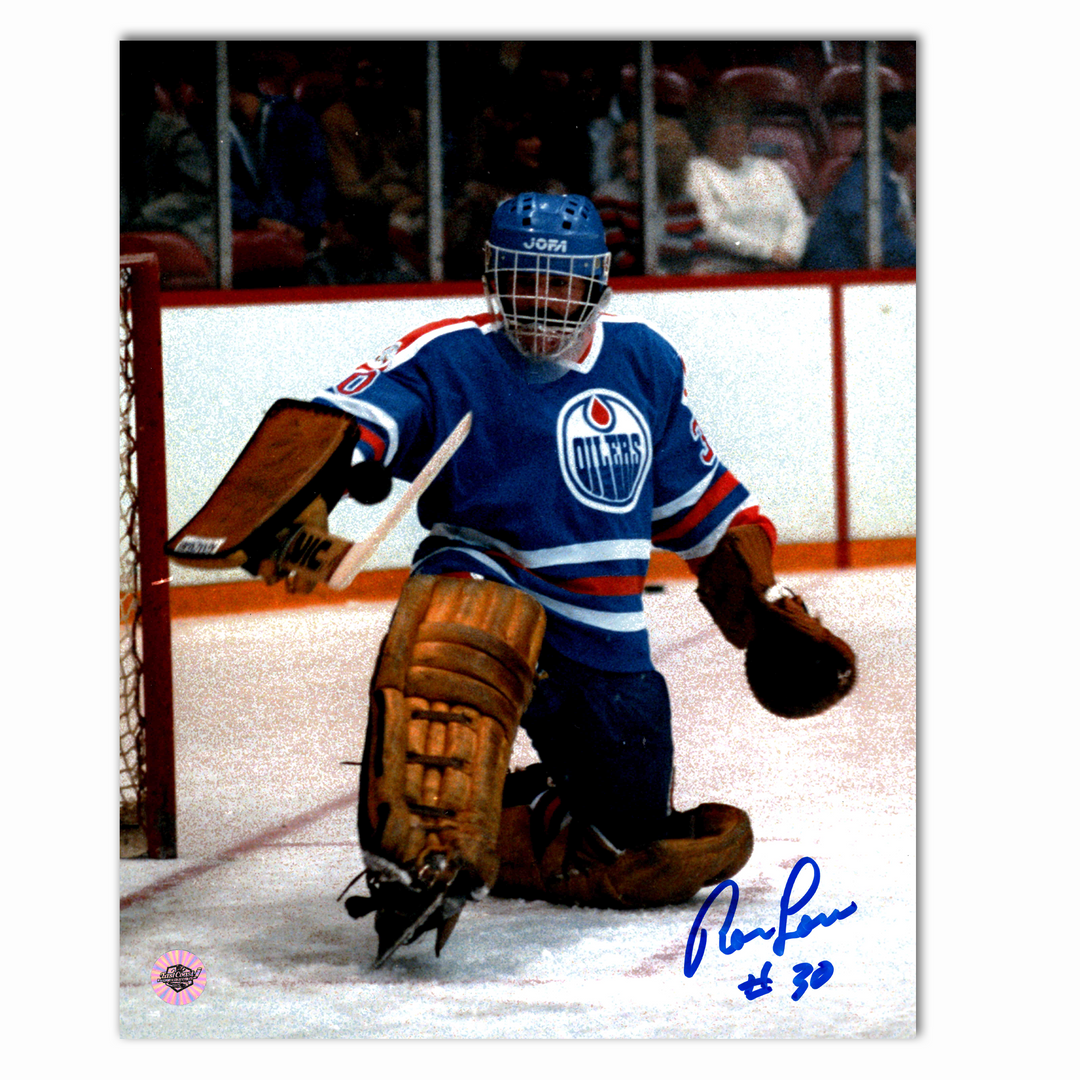 Ron Low Autographed Edmonton Oilers Home 8x10 Photo (Sliding)