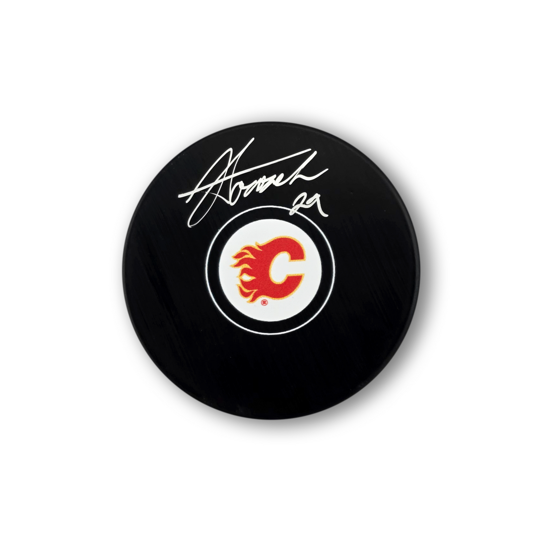 Sam Honzek Autographed Calgary Flames Hockey Puck