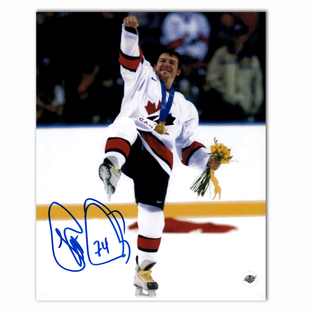 Theo Fleury Autographed Team Canada 8x10 Photo (Celebration)