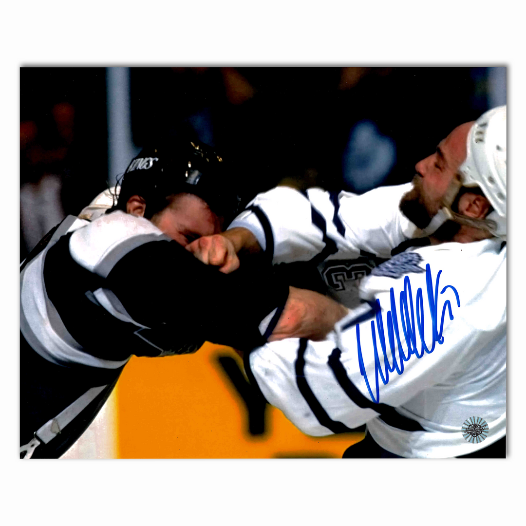 Wendel Clark Autographed Toronto Maple Leafs Fighting 8x10 Photo